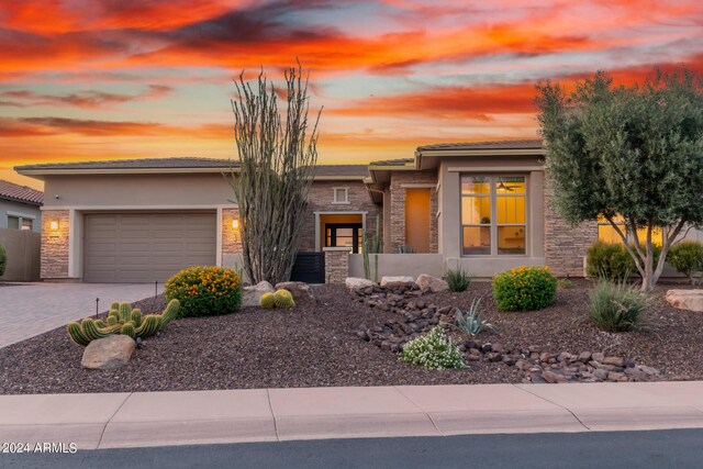 prairie-style home with a garage