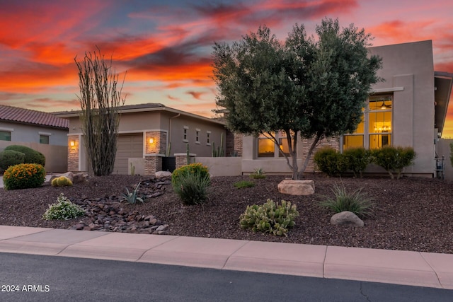 view of front of home with a garage