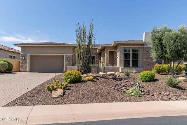 view of front of home with a garage