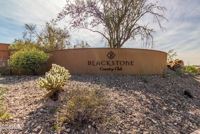 view of community sign