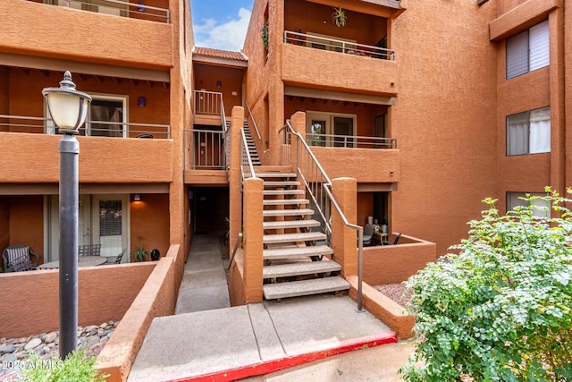 view of building exterior with stairs