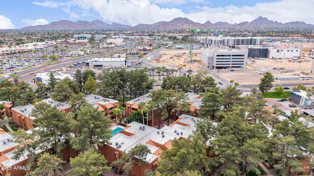 birds eye view of property featuring a mountain view