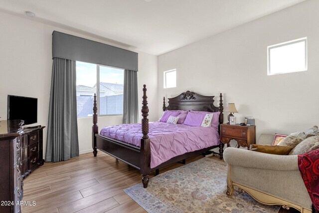 bedroom with light wood-type flooring