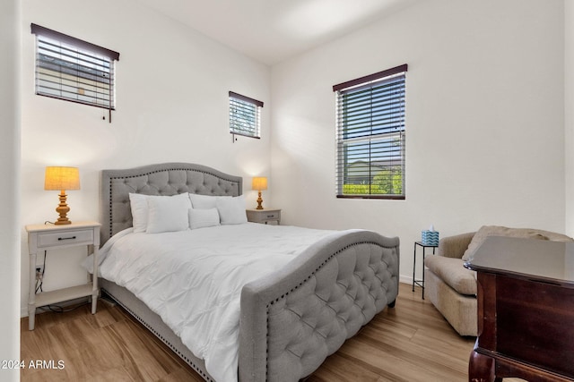 bedroom with light hardwood / wood-style floors