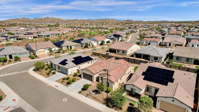 birds eye view of property featuring a mountain view