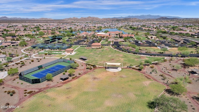 birds eye view of property with a mountain view