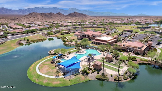 aerial view featuring a water and mountain view