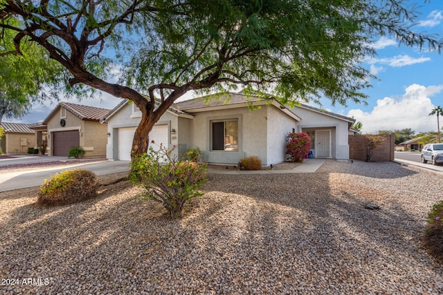 single story home with a garage