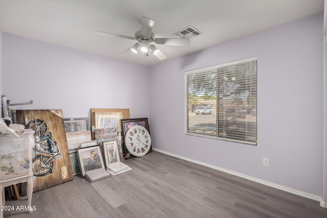 miscellaneous room featuring wood-type flooring and ceiling fan