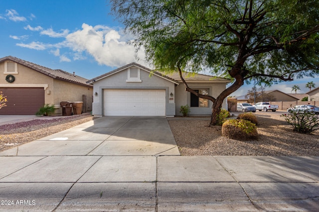 single story home with a garage