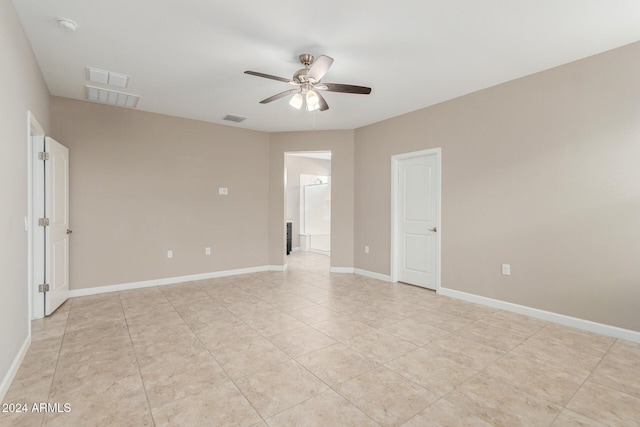 unfurnished room featuring ceiling fan