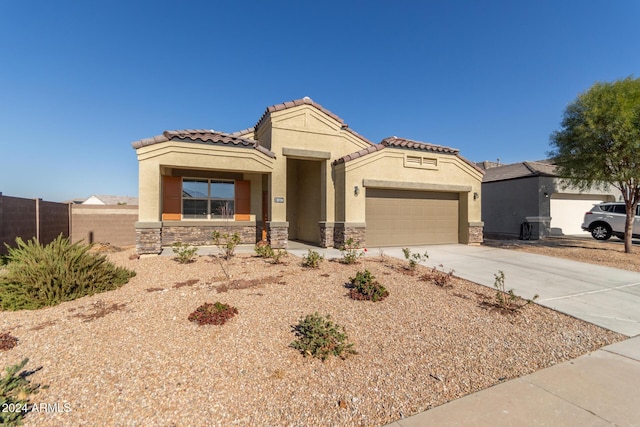 view of front of property featuring a garage