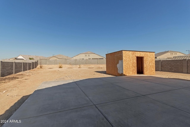 view of patio / terrace with a storage unit