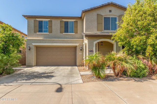 view of front of home with a garage