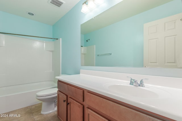 full bathroom with tile patterned floors, vanity, shower / tub combination, and toilet