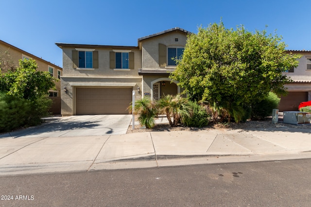 view of front of property featuring a garage