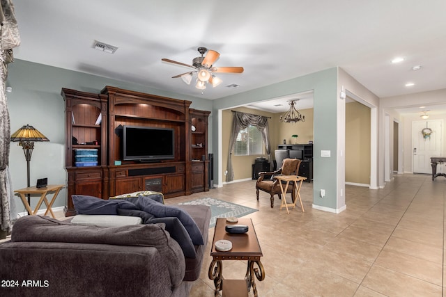 tiled living room featuring ceiling fan