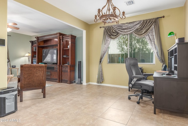 office with light tile patterned flooring and ceiling fan with notable chandelier