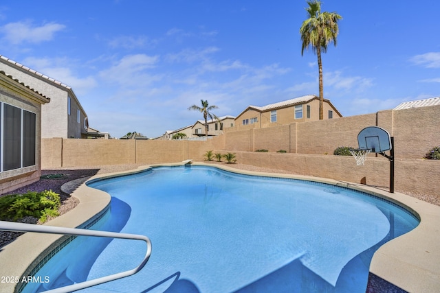 view of pool featuring a fenced backyard and a fenced in pool