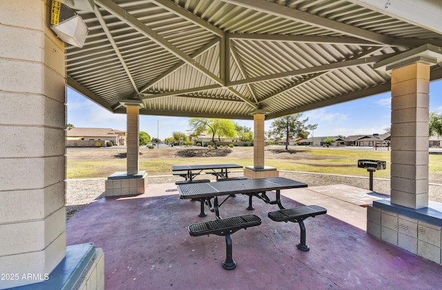 surrounding community featuring a patio