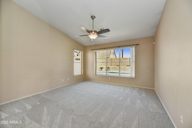 spare room featuring visible vents, carpet flooring, ceiling fan, and baseboards