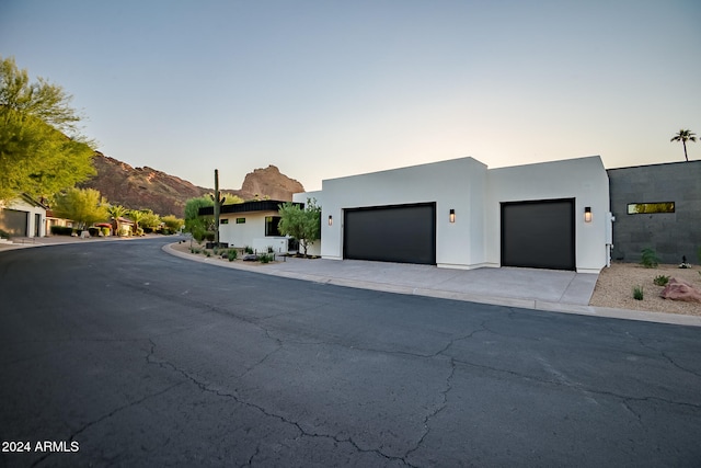 view of front of home with a mountain view