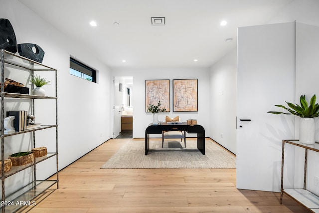 office space featuring light wood-type flooring