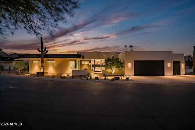 view of front of home with a garage