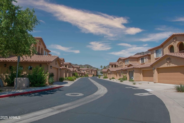 10655 N 9th St Unit 112, Phoenix, AZ 85020 - view of asphalt road with a residential view and sidewalks
