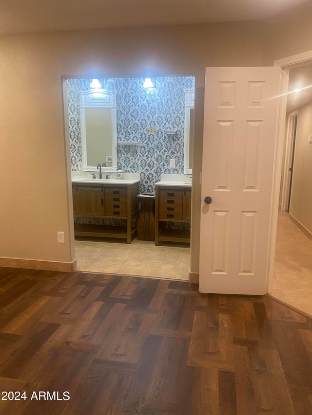 bathroom featuring wood-type flooring and vanity