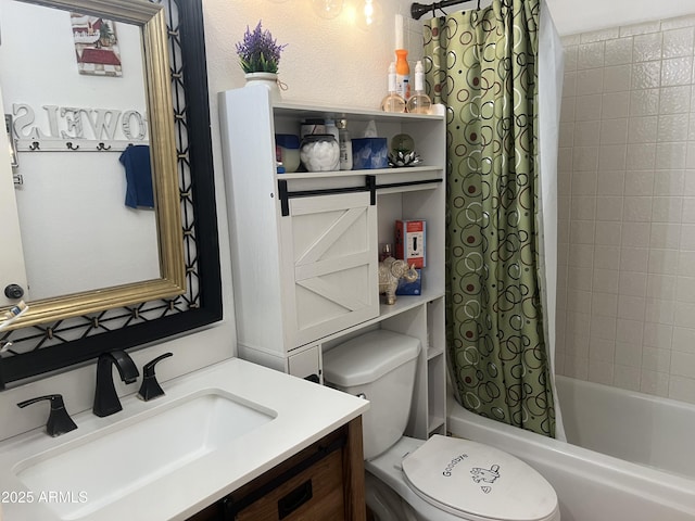 full bathroom with shower / tub combo with curtain, vanity, and toilet