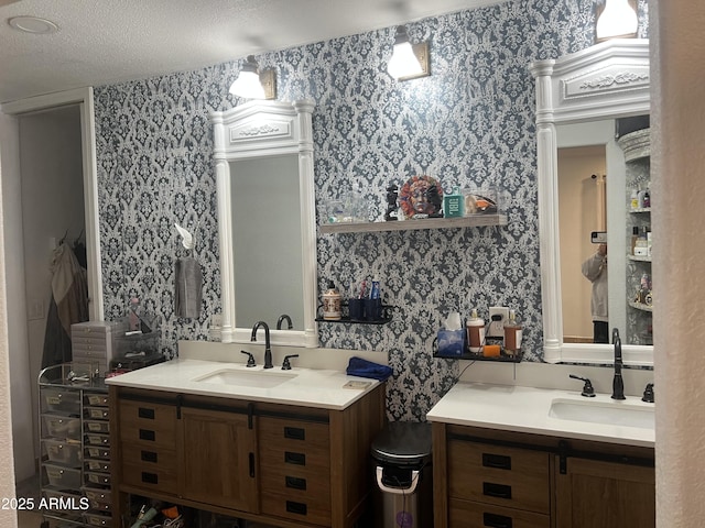 bathroom featuring vanity and a textured ceiling