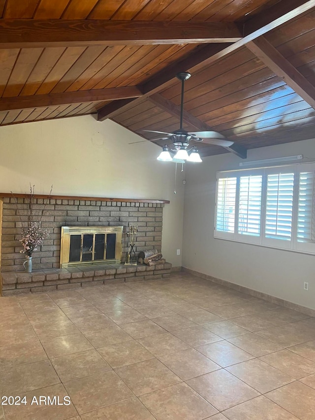 unfurnished living room with wood ceiling, ceiling fan, vaulted ceiling with beams, a fireplace, and light tile patterned flooring