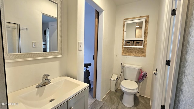 1520 W Encanto Blvd, Phoenix, AZ 85007 - bathroom featuring toilet, vanity, and tile patterned floors
