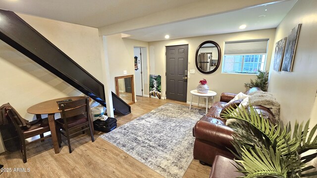 1520 W Encanto Blvd, Phoenix, AZ 85007 - living area with stairway, light wood finished floors, and recessed lighting