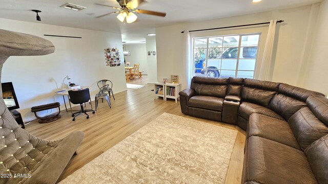 1520 W Encanto Blvd, Phoenix, AZ 85007 - living area featuring light wood-type flooring, a ceiling fan, and visible vents