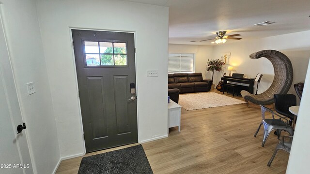 1520 W Encanto Blvd, Phoenix, AZ 85007 - foyer with visible vents, light wood finished floors, baseboards, and ceiling fan