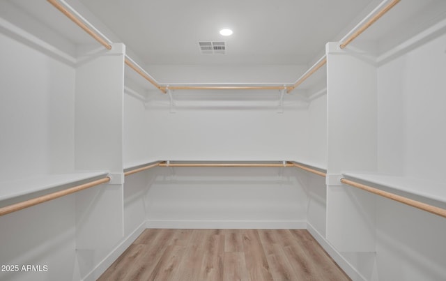 walk in closet with visible vents and light wood-style flooring