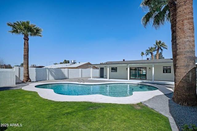 view of pool featuring a fenced backyard, a lawn, a patio, and a fenced in pool