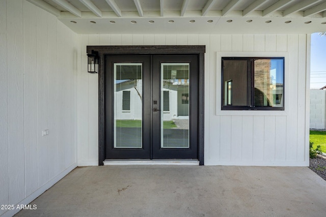 doorway to property featuring french doors