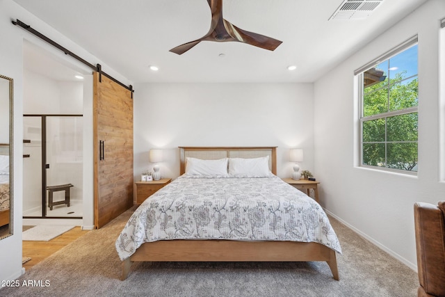2628 S Voyager Dr Unit 104, Gilbert, AZ 85295 - carpeted bedroom featuring a barn door, recessed lighting, baseboards, and ceiling fan