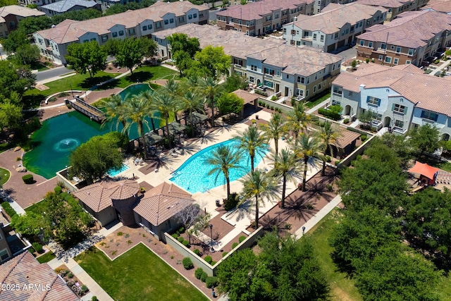 2628 S Voyager Dr Unit 104, Gilbert, AZ 85295 - bird's eye view of a pool and a nearby body of water
