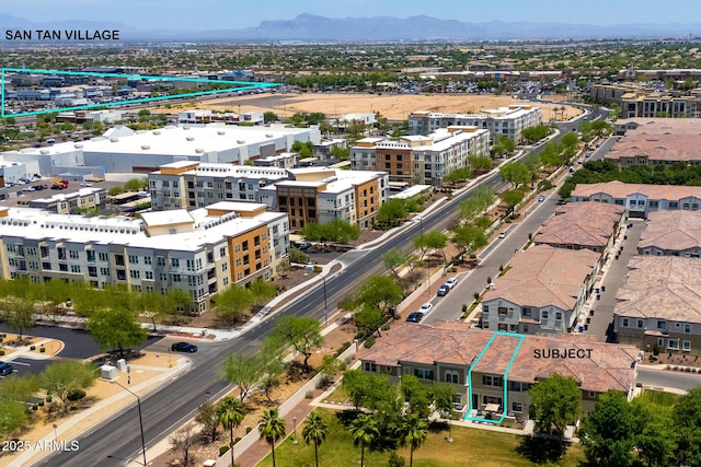 2628 S Voyager Dr Unit 104, Gilbert, AZ 85295 - aerial overview of property's location featuring property boundaries highlighted and a mountainous background