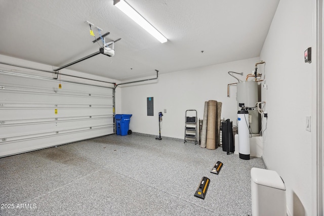 2628 S Voyager Dr Unit 104, Gilbert, AZ 85295 - garage with electric panel, a garage door opener, and baseboards