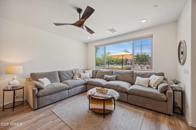2628 S Voyager Dr Unit 104, Gilbert, AZ 85295 - living room with light wood-style flooring, a ceiling fan, and recessed lighting