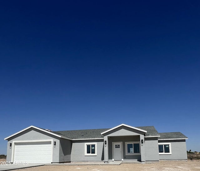 3767 N 363rd Ave, Tonopah, AZ 85354 - view of front of home with an attached garage and stucco siding