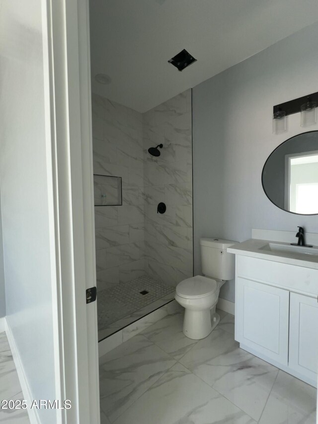3767 N 363rd Ave, Tonopah, AZ 85354 - bathroom with marble look tile flooring, vanity, and a marble finish shower