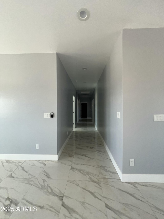 3767 N 363rd Ave, Tonopah, AZ 85354 - hallway with baseboards and marble look tile flooring