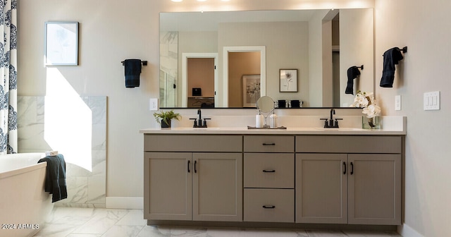 bathroom with dual sinks, tile flooring, and vanity with extensive cabinet space