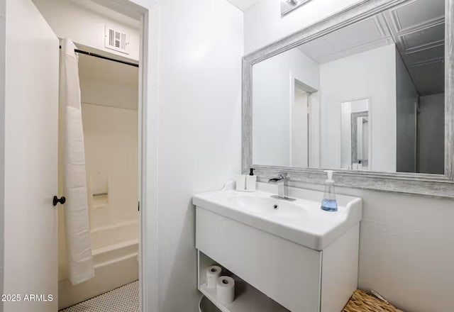full bath with visible vents, shower / tub combo with curtain, and vanity